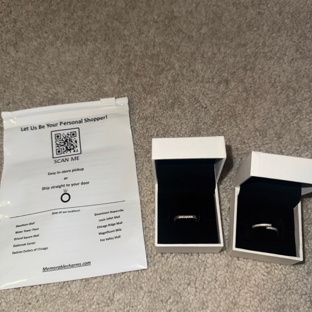 two silver pandora rings